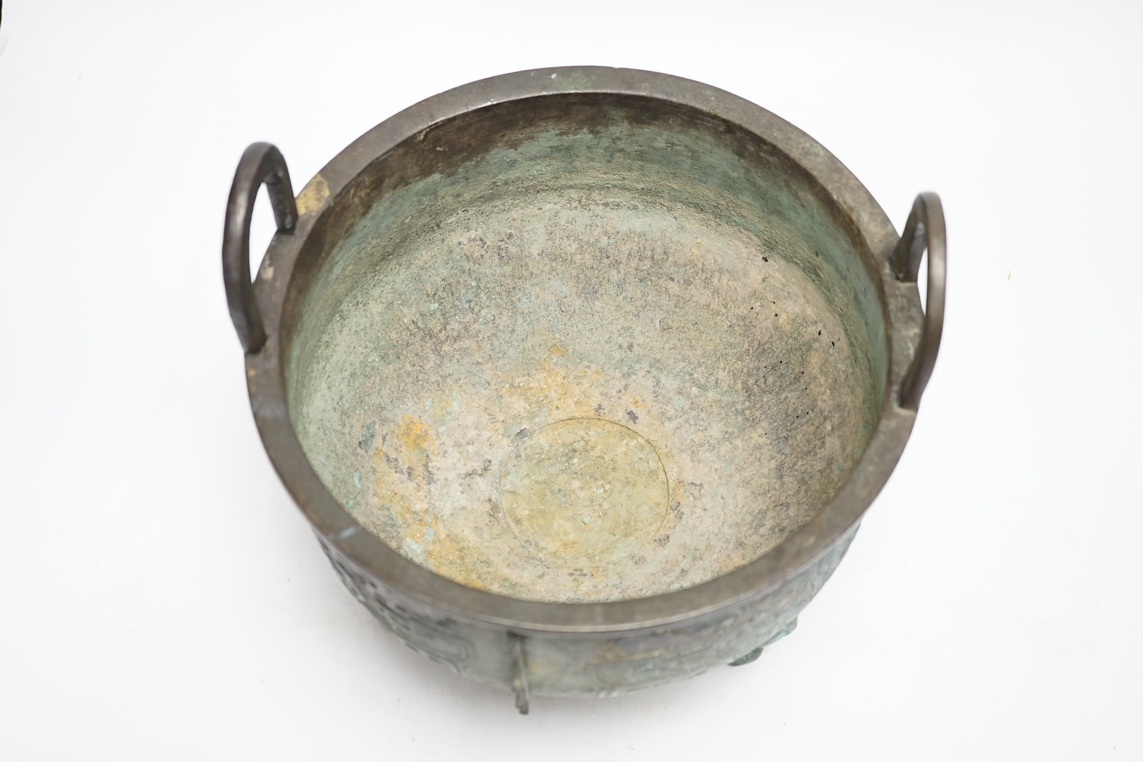 A large Chinese parcel gilt bronze tripod censer, 24.5cm high, 25cm diameter. Condition - fair